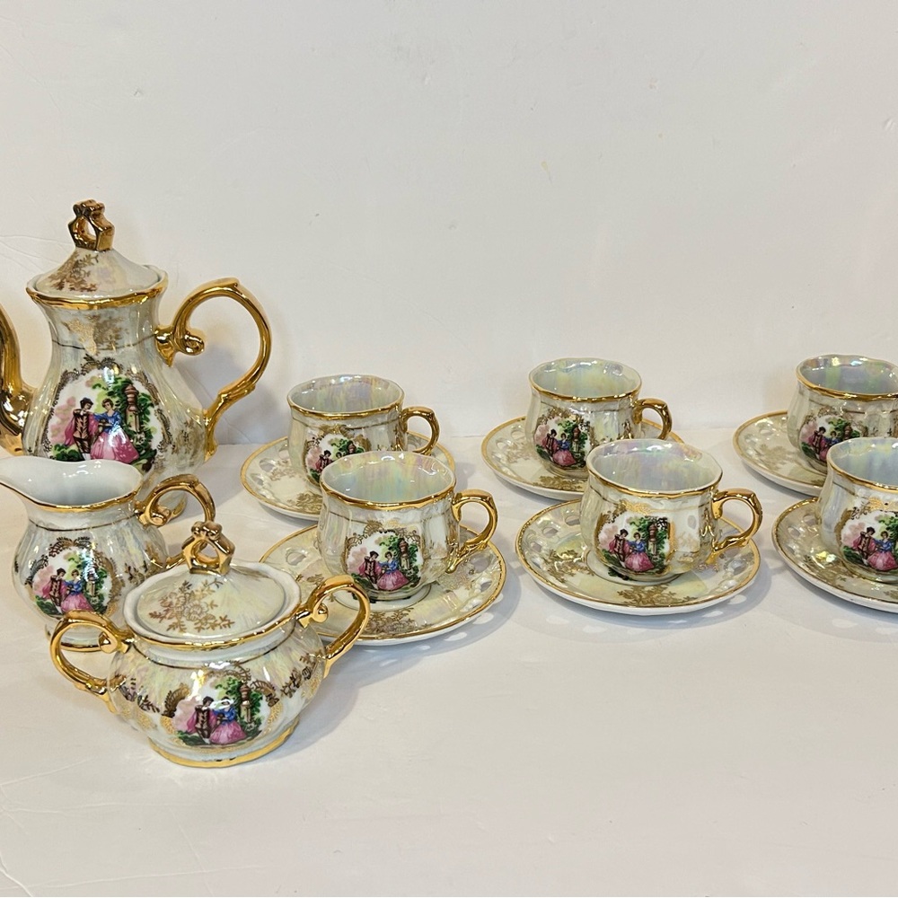 Japan Rags Cream and Gold Porcelain Tea Set with Decorative Scenes